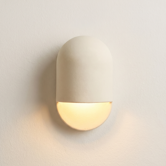 Capsule, applique céramique, vue de face